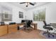 Bright home office features a large window, two desks, and comfortable chairs at 4355 E Cullumber St, Gilbert, AZ 85234