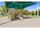Shaded playground structure with slide and climbing features, perfect for outdoor fun at 4355 E Cullumber St, Gilbert, AZ 85234