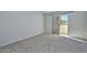 Bedroom with a sliding glass door leading to a balcony, providing natural light at 4730 W Northern Ave # 1141, Glendale, AZ 85301