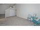 Open living room features high ceilings, a ceiling fan, and carpeted floors at 4730 W Northern Ave # 1141, Glendale, AZ 85301