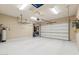 Clean, well-lit garage with ample storage space and an automatic door at 5330 S Big Horn Pl, Chandler, AZ 85249