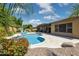 Sparkling pool with patio and desert landscaping, ideal for relaxation and entertaining at 5330 S Big Horn Pl, Chandler, AZ 85249
