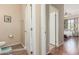 This bathroom features neutral wall paint and tile flooring, seamlessly connecting to an adjacent bedroom at 5635 W Pecan Rd, Laveen, AZ 85339