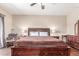 Comfortable primary bedroom featuring wood flooring and stylish furnishings at 5635 W Pecan Rd, Laveen, AZ 85339