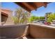 Exterior balcony with trees and parking at 5757 W Eugie Ave # 2084, Glendale, AZ 85304