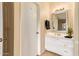 Bright bathroom with a vanity, framed mirror, and storage in a neutral color palette at 5757 W Eugie Ave # 2084, Glendale, AZ 85304