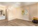 Spacious bedroom featuring modern flooring, neutral walls, and en-suite bathroom access at 5757 W Eugie Ave # 2084, Glendale, AZ 85304