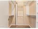 Well-organized closet with double hanging rods and adjustable shelving for storage at 5757 W Eugie Ave # 2084, Glendale, AZ 85304