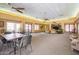 Enjoy ample seating and natural light in the community room at 5757 W Eugie Ave # 2084, Glendale, AZ 85304