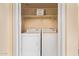 Practical laundry closet with a full-size washer and dryer for convenient laundry at 5757 W Eugie Ave # 2084, Glendale, AZ 85304