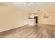 Bright living area featuring stylish flooring, a ceiling fan and kitchen access at 5757 W Eugie Ave # 2084, Glendale, AZ 85304