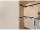 Water heater in utility closet with shelves at 5757 W Eugie Ave # 2084, Glendale, AZ 85304