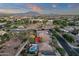 High-angle view of home featuring private pool and mountain views, nestled in a quiet, Gathering-friendly neighborhood at 5919 S Banning St, Gilbert, AZ 85298