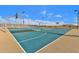 Community basketball court surrounded by desert landscaping and plenty of room for spectators at 5919 S Banning St, Gilbert, AZ 85298