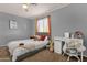 Cozy bedroom with natural light and whimsical decor at 5919 S Banning St, Gilbert, AZ 85298