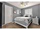 Bright bedroom with a window, ceiling fan, and stylish decor creates a relaxing space at 5919 S Banning St, Gilbert, AZ 85298