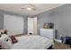 Cozy bedroom with carpet, ceiling fan, and closet offers comfort and functionality at 5919 S Banning St, Gilbert, AZ 85298
