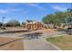 Community park features a playground, shaded seating, and walking paths, perfect for outdoor recreation and Gathering activities at 5919 S Banning St, Gilbert, AZ 85298