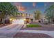 Charming two-story home featuring well-maintained landscaping and a spacious two-car garage at 5919 S Banning St, Gilbert, AZ 85298