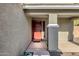 Charming front entry featuring a covered porch and well-maintained yard at 5919 S Banning St, Gilbert, AZ 85298