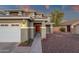 Close-up of beautiful home highlighting architectural details and a welcoming entrance at 5919 S Banning St, Gilbert, AZ 85298