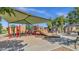 Shaded playground with slides, climbing structures, and alphabet learning station at 5919 S Banning St, Gilbert, AZ 85298