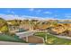 Modern community playground with climbing area, bridge, and seating at 5919 S Banning St, Gilbert, AZ 85298