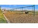 Swinging at the community playground; open space, and beautiful mountain views abound in this park area at 5919 S Banning St, Gilbert, AZ 85298