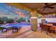 Beautiful pool area with patio seating, perfect for enjoying the outdoors and relaxing by the water at 5919 S Banning St, Gilbert, AZ 85298