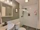 Well-appointed bathroom with modern fixtures, subway tile shower, and sleek vanity at 6570 S Pewter Way, Chandler, AZ 85249