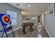 Game room with a foosball table, light laminate flooring, and a target with colorful accents at 6570 S Pewter Way, Chandler, AZ 85249