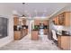 Bright kitchen with stainless steel appliances, granite countertops and a center island at 6570 S Pewter Way, Chandler, AZ 85249