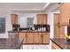Kitchen with granite countertops, stainless steel appliances, and a tile backsplash at 6570 S Pewter Way, Chandler, AZ 85249