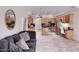 Open-concept living room and kitchen with tile floors at 6570 S Pewter Way, Chandler, AZ 85249