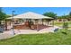 Community playground featuring covered picnic area, play equipment, and swings at 6570 S Pewter Way, Chandler, AZ 85249