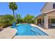 Backyard pool and patio are ideal for outdoor enjoyment and relaxation at 6570 S Pewter Way, Chandler, AZ 85249