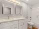 Bright bathroom with double sinks and a shower/tub combination at 6843 S 46Th Dr, Laveen, AZ 85339