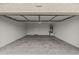 Spacious garage with water heater and an automatic door system at 6843 S 46Th Dr, Laveen, AZ 85339