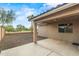 Covered patio with concrete slab and view of the backyard at 6843 S 46Th Dr, Laveen, AZ 85339