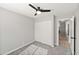 Bedroom featuring a ceiling fan, carpet, and closet at 7108 W Corrine Dr, Peoria, AZ 85381
