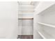 Walk-in closet featuring built in shelving and hanging storage at 7108 W Corrine Dr, Peoria, AZ 85381
