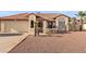 Charming single-story home featuring a tile roof, desert landscaping, and a two-car garage at 7108 W Corrine Dr, Peoria, AZ 85381