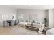 Spacious living room connecting to dining area with modern furnishings and neutral tones at 7108 W Corrine Dr, Peoria, AZ 85381