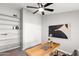 Bright office space featuring built in shelving, stylish decor, and ample storage at 7108 W Corrine Dr, Peoria, AZ 85381
