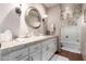 Bright bathroom featuring a single sink vanity with tile countertops, and a tub and shower combination at 7131 N 40Th St, Paradise Valley, AZ 85253