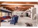 Open-concept living room features beamed ceilings, comfortable furnishings, and seamless flow to other living spaces at 7131 N 40Th St, Paradise Valley, AZ 85253