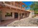Spacious covered patio with outdoor dining area, offering a relaxing space for entertaining and enjoying the outdoors at 7131 N 40Th St, Paradise Valley, AZ 85253
