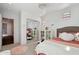 Bright, kid-friendly bedroom with pink accents, mirrored closet, and plush details at 7169 E Bramble Berry Ln, Scottsdale, AZ 85266