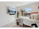 Modern bedroom with large window offering views of the backyard patio at 7169 E Bramble Berry Ln, Scottsdale, AZ 85266