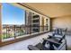 Relax on this spacious balcony with wrought iron railing and comfortable seating at 7175 E Camelback Rd # 510, Scottsdale, AZ 85251